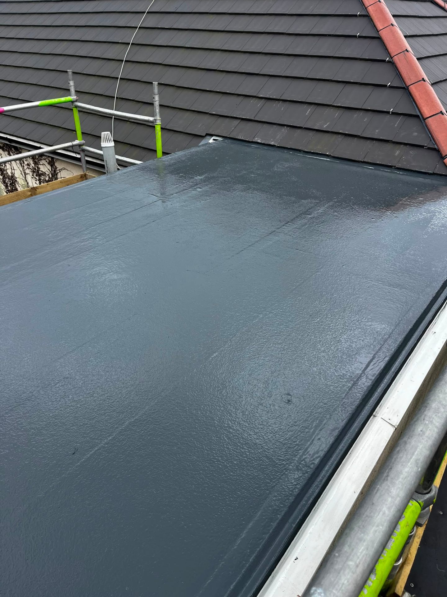 Completed red clay plain tile roof on a Merseyside gable end by RTC Roofing